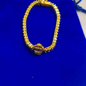 Beautiful Kurt Geiger Eagle gold and stones bracelet.